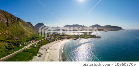 Drone panorama of Jusnesvika Bay, Rambergstranda, Flakstadoya, Lofoten: Village, curving shore Drone panorama of Jusnesvika Bay, Rambergstranda, Flakstadoya, Lofoten: Village, curving shore 109602709