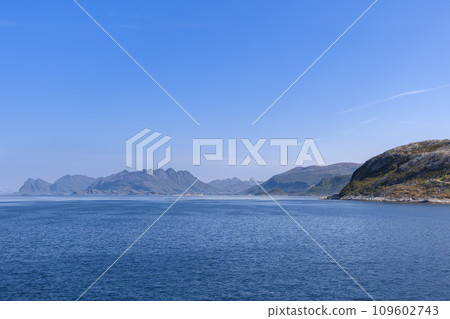 Scenic North Sea and mountain view from ferry to Lofoten Island on sunny summer day 109602743