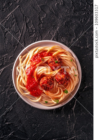 Meatballs. Beef meat balls, overhead flat lay shot with spaghetti pasta Meatballs. Beef meat balls, overhead flat lay shot with spaghetti pasta 109603317
