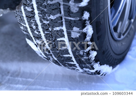 Studless tires with snow on them Studless tires with snow on them 109603344