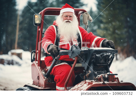 santa claus dressed with red clothes, driving a excavator machine 109603732