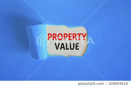 Property value symbol. Concept words Property value on beautiful white paper. Beautiful blue paper background. Business property value concept. Copy space. Property value symbol. Concept words Property value on beautiful white paper. Beautiful blue paper background. Business property value concept. Copy space. 109604638