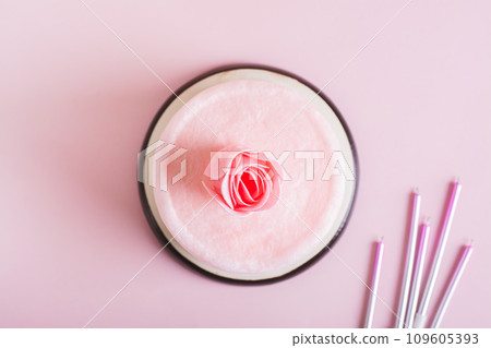 Close up of cotton candy cake and party decorations on the table top view 109605393