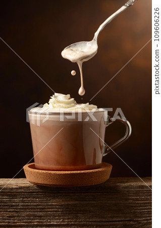 Hot chocolate with whipped cream. 109606226