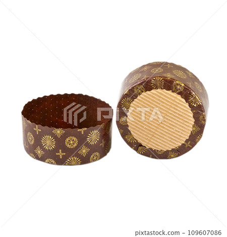 Panettone paper baking form isolated over white background Panettone paper baking form isolated over white background 109607086