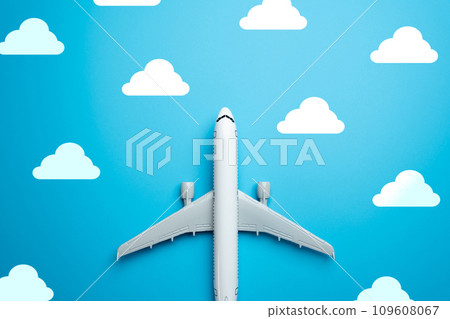 Airline plane flying through the clouds, concept. Business and tourism. Airline. World communication and commercial flights. Good weather and optimism. 109608067