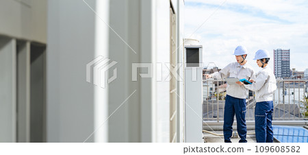 Engineer inspecting building equipment Engineer inspecting building equipment 109608582