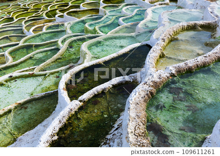 Travertine formations in Egerszalok spa resort Travertine formations in Egerszalok spa resort 109611261