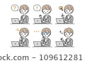 A woman in a suit using a computer 109612281