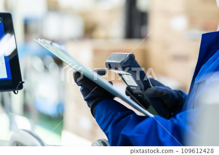 Worker checking inspection list, faceless Worker checking inspection list, faceless 109612428