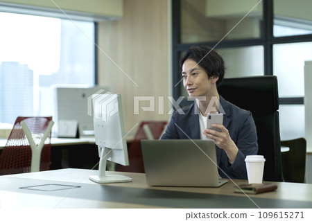 Male businessman working in the office Male businessman working in the office 109615271
