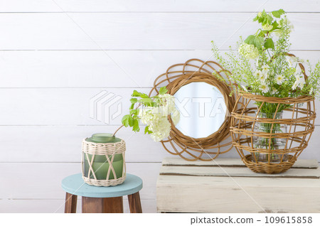 rattan basket and white flowers 109615858