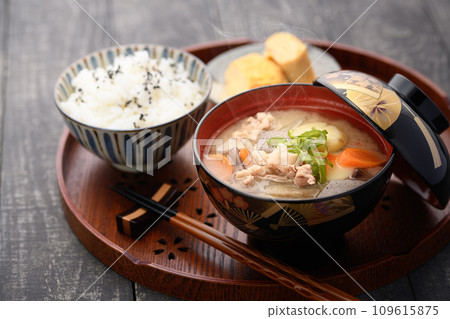 Pork soup, rice, and fried egg filled with seasonal vegetables Pork soup, rice, and fried egg filled with seasonal vegetables 109615875