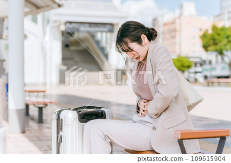 A business woman who became unwell at the station or while traveling 109615904