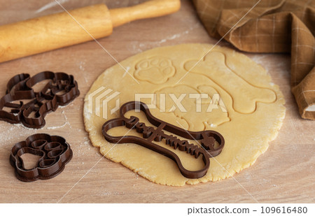 Preparing homemade healthy dog treats. Preparing homemade healthy dog treats. 109616480