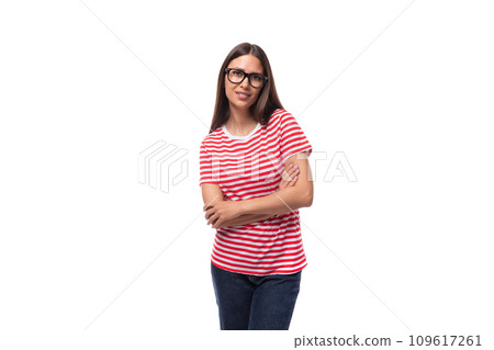portrait of a young well-groomed european woman with straight black hair in glasses on a white 109617261