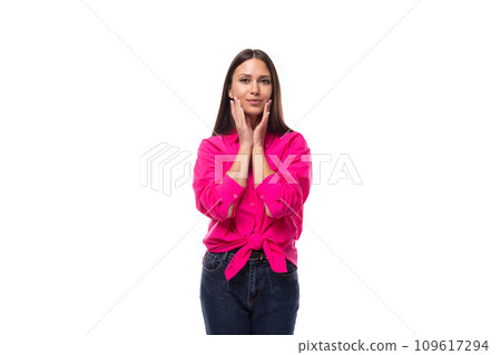 charming young brunette businesswoman dressed in a pink shirt tied it at the waist charming young brunette businesswoman dressed in a pink shirt tied it at the waist 109617294