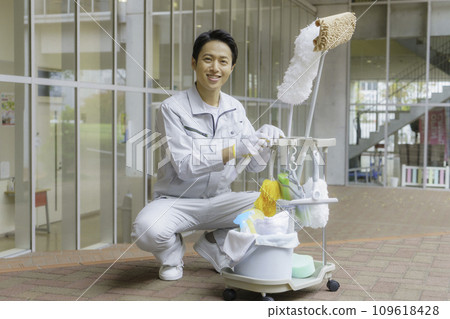 Portrait of a male cleaner at an office building Photography cooperation: Ariake College of Education and Arts 109618428
