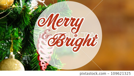Composition of merry and bright text over baubles on christmas tree 109621325