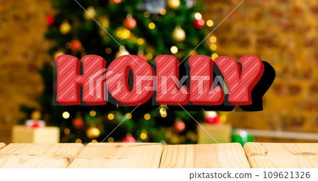 Composition of holly text over christmas tree 109621326