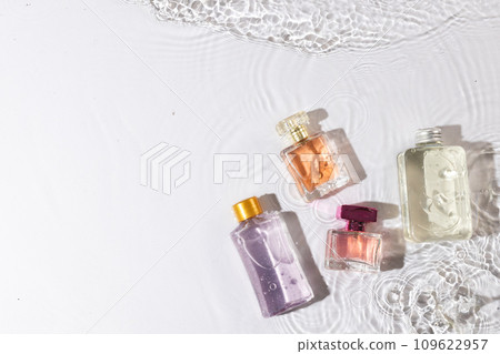 Beauty product bottles in water with copy space background on white background 109622957