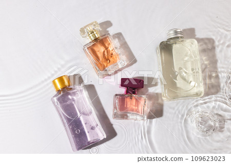 Beauty product bottles in water with copy space background on white background Beauty product bottles in water with copy space background on white background 109623023