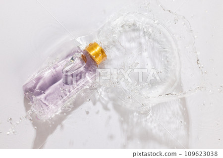 Beauty product bottle in water with copy space background on white background Beauty product bottle in water with copy space background on white background 109623038