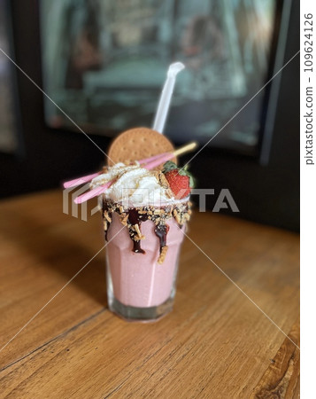 Milkshake Strawberry with cookies and strawberry toppings Milkshake Strawberry with cookies and strawberry toppings 109624126