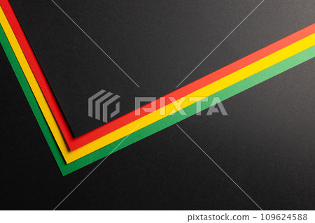 Green, yellow and red papers with copy space on black background Green, yellow and red papers with copy space on black background 109624588