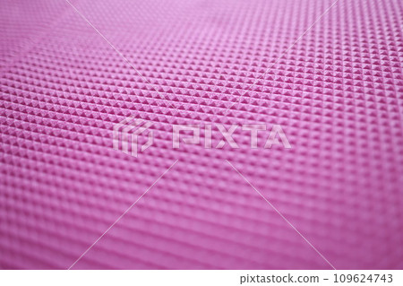 Pink texture of a sports mat and rubber pattern for background Pink texture of a sports mat and rubber pattern for background 109624743