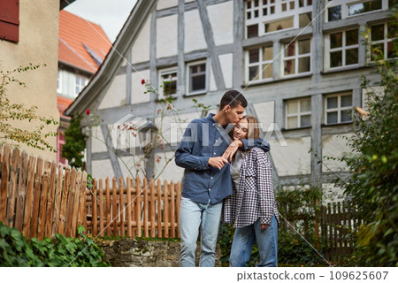 Warm Embrace of Teen Love in the Autumn Park. Capturing Teen Moments: Love Blossoms in Autumn's Embrace. Teenagers in Love: Embracing the Autumn Vibe 109625607