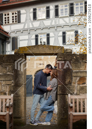 Warm Embrace of Teen Love in the Autumn Park. Capturing Teen Moments: Love Blossoms in Autumn's Embrace. Teenagers in Love: Embracing the Autumn Vibe 109625618