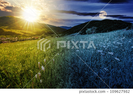 mountainous rural landscape with pasture. herbs on hill and sun and moon on the sky at summer solstice. day and night time change concept. mysterious countryside scenery in morning light 109627982
