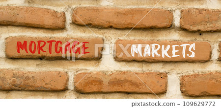 Mortgage markets symbol. Concept words Mortgage markets on beautiful brown brick wall. Beautiful brown brick wall background. Business mortgage markets concept. Copy space. Mortgage markets symbol. Concept words Mortgage markets on beautiful brown brick wall. Beautiful brown brick wall background. Business mortgage markets concept. Copy space. 109629772