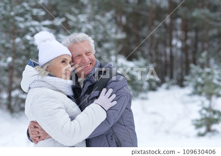 Happy senior couple at snowy winter park Happy senior couple at snowy winter park 109630406