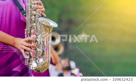 Music instrument is being played by hands 109632423