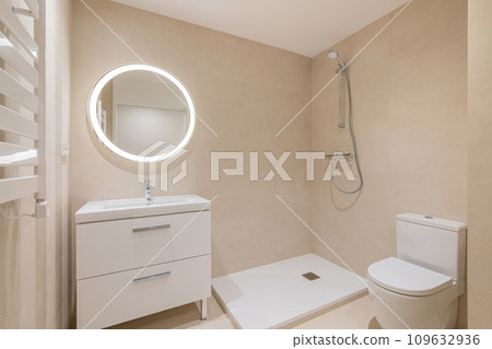Bathroom with toilet shower area and washbasin with drawer 109632936