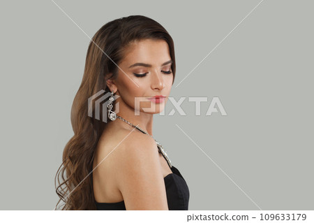 Perfect brunette fashion beauty portrait. Young model woman with long dark healthy hair Perfect brunette fashion beauty portrait. Young model woman with long dark healthy hair 109633179