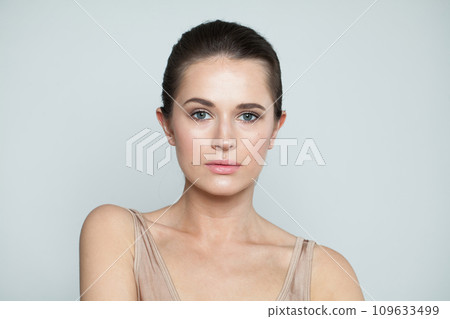 Attractive fashion beauty model brunette with clear skin and dark hair. Attractive fashion beauty model brunette with clear skin and dark hair. 109633499