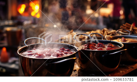 Traditional Christmas food in cauldron and pot on fire background.  109633781