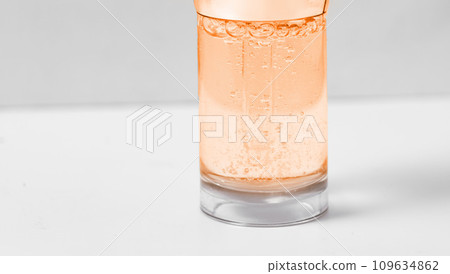 Hyaluronic acid in glass bottle on white background with clipping path close-up, Liquid gel or serum bubbles, Medicine and Pharmacology. Beauty skin care concept Beauty and spa. 109634862