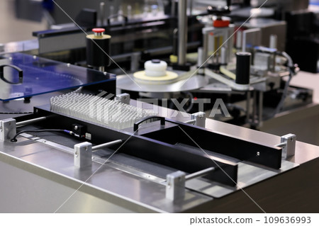 production conveyor line in pharmaceutical factory 109636993