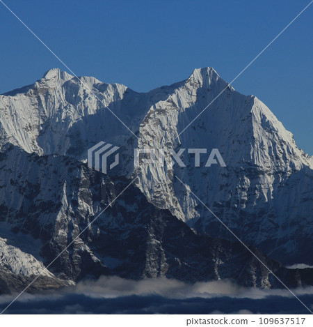 Snow covered high mountain Kusum Kanguru seen from Gokyo Ri, Nepal. 109637517