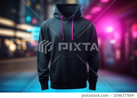 black hooded sweatshirt hanging from a display in front of a neon 109637984