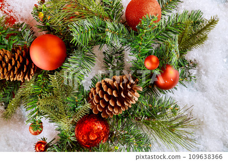 Happy New Year Christmas fir tree branches with of balls with festive decoration holiday background Happy New Year Christmas fir tree branches with of balls with festive decoration holiday background 109638366