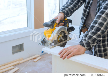 Manual circular saw must be used to cut interior doors to their required dimensions prior to installation 109638662