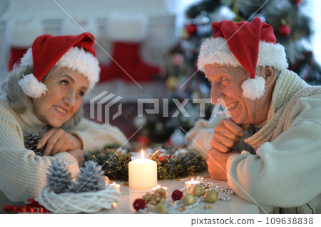 Portrait of senior couple preparing for Christmas Portrait of senior couple preparing for Christmas 109638838