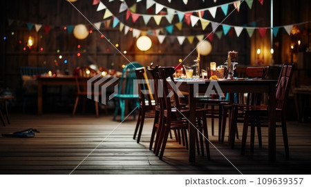 the floor of a wooden dining room with colourful bunting hanging over the floor of a wooden dining room with colourful bunting hanging over 109639357