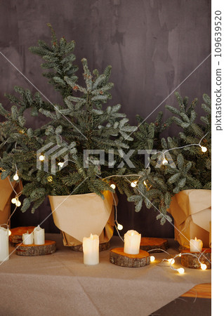 Cozy Christmas scene with wrapped gifts and candles 109639520