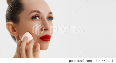 Photo of young beautiful smiling woman applying 109639981